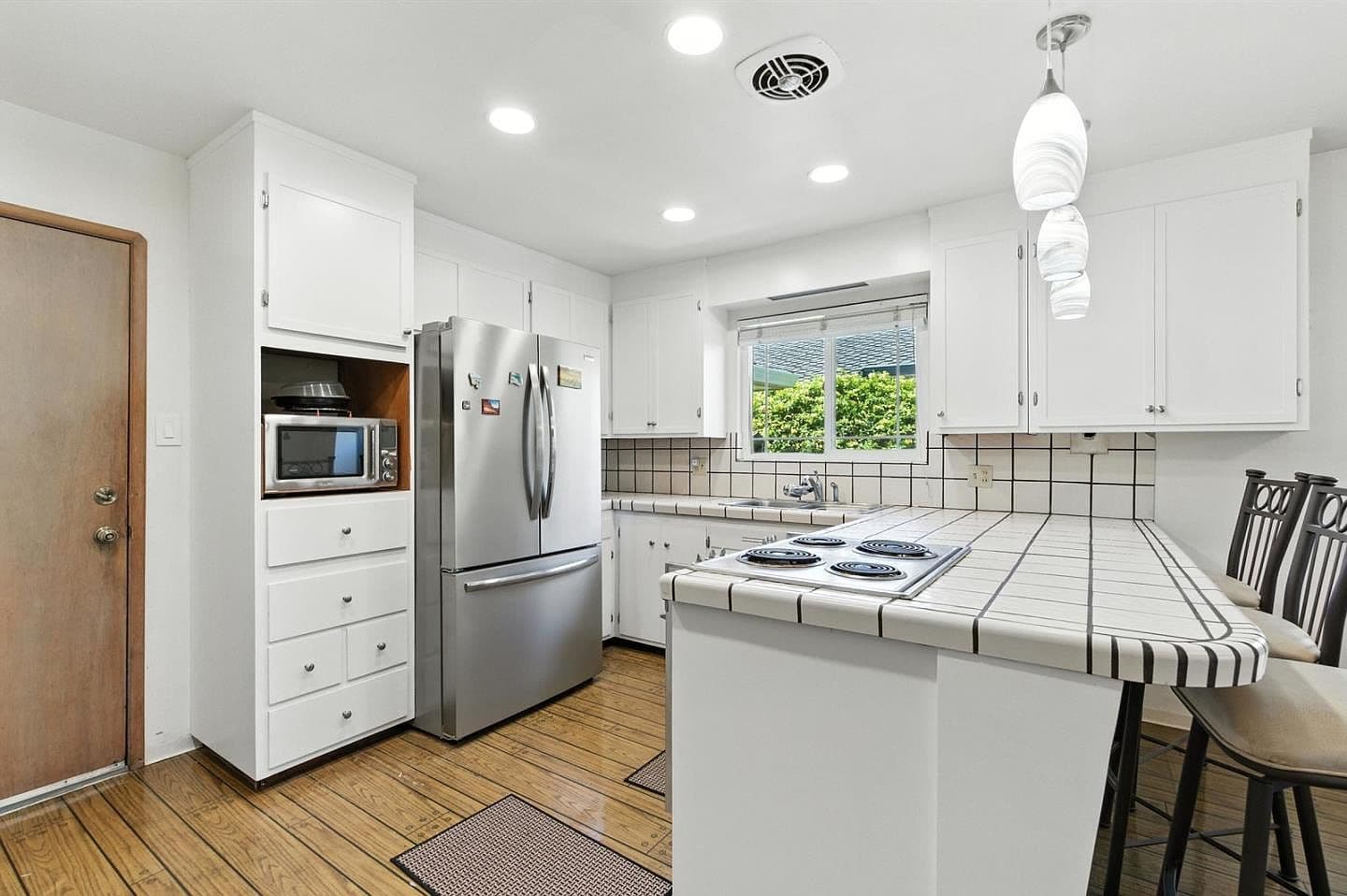 Outdated Tile Countertops and Backsplash