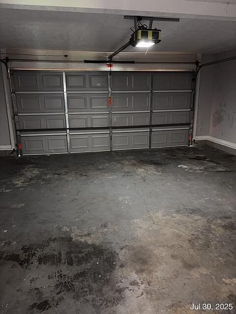 Cracked and Stained Garage Floor
